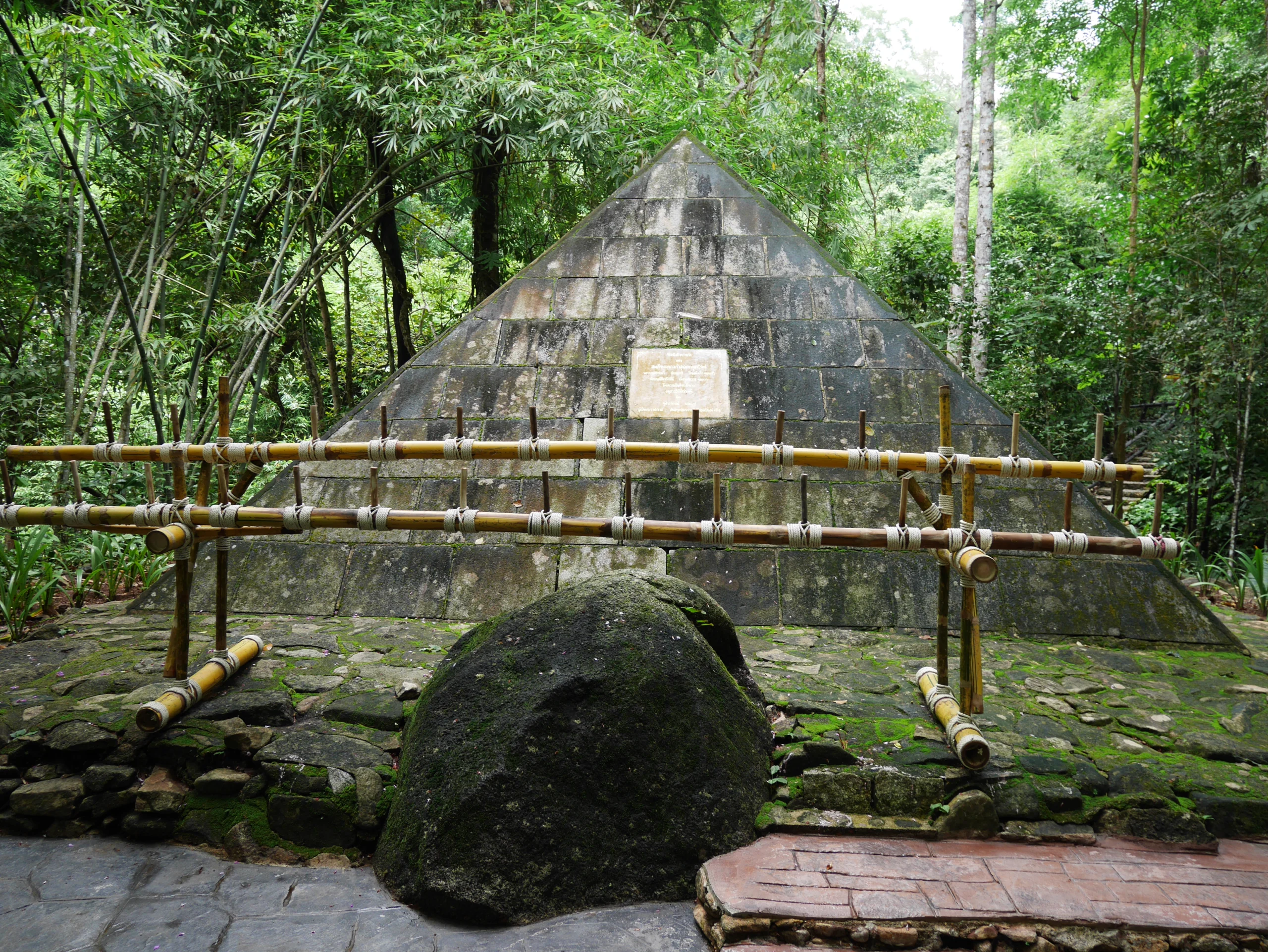 Stone pyramid memorial chedi in the forest at Namtok Phlio National Park, Chanthaburi