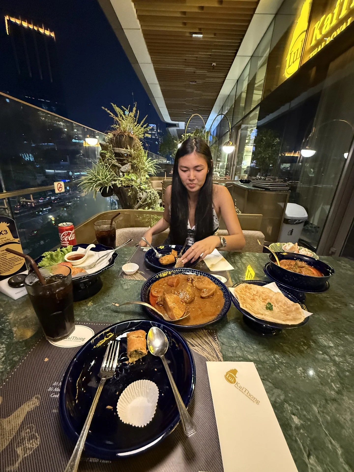 Massaman lamb shank curry with roti and the full dinner spread at Luk Kaithong One Bangkok