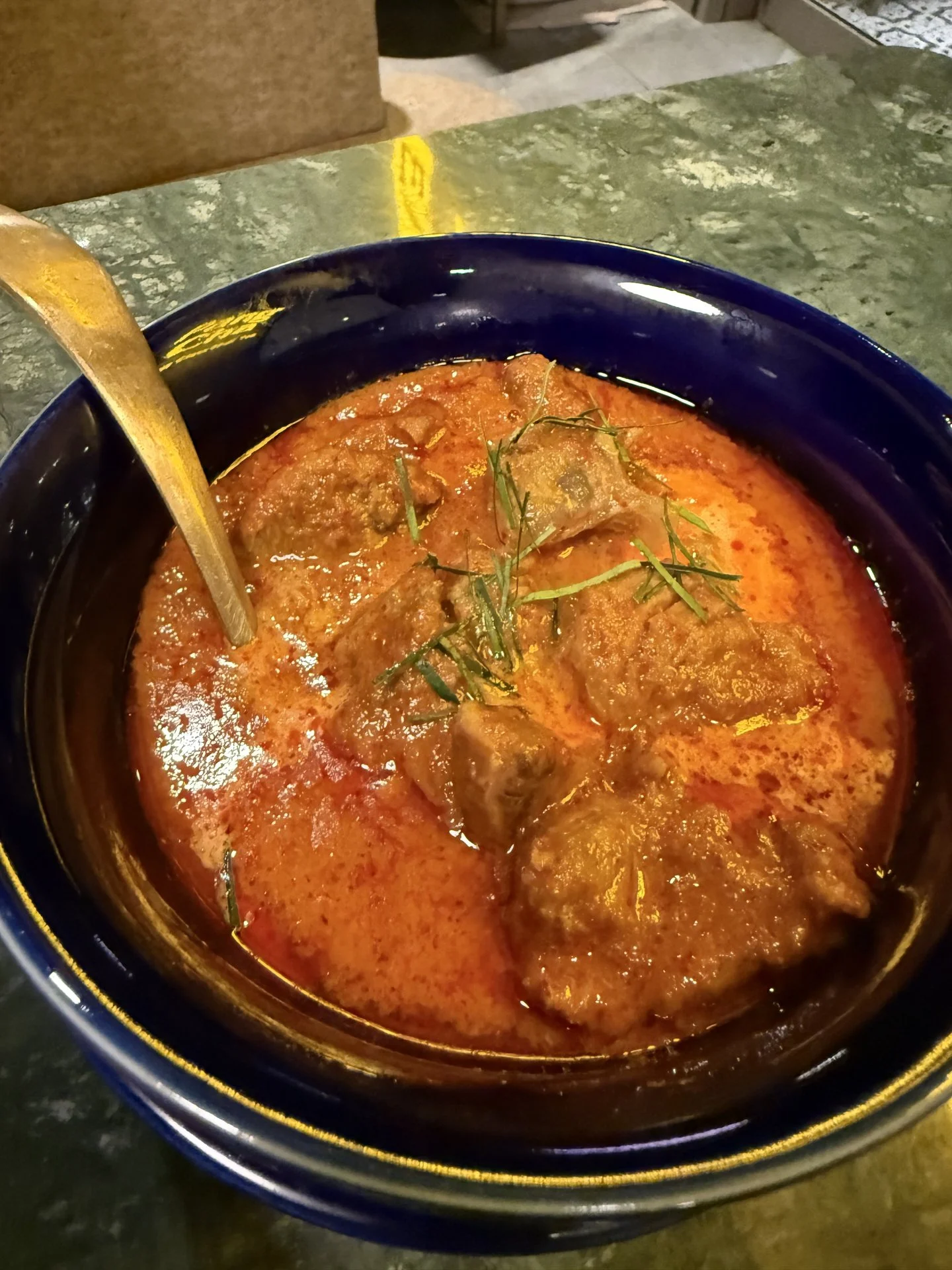 Panang curry topped with shredded kaffir lime leaves at Luk Kaithong One Bangkok