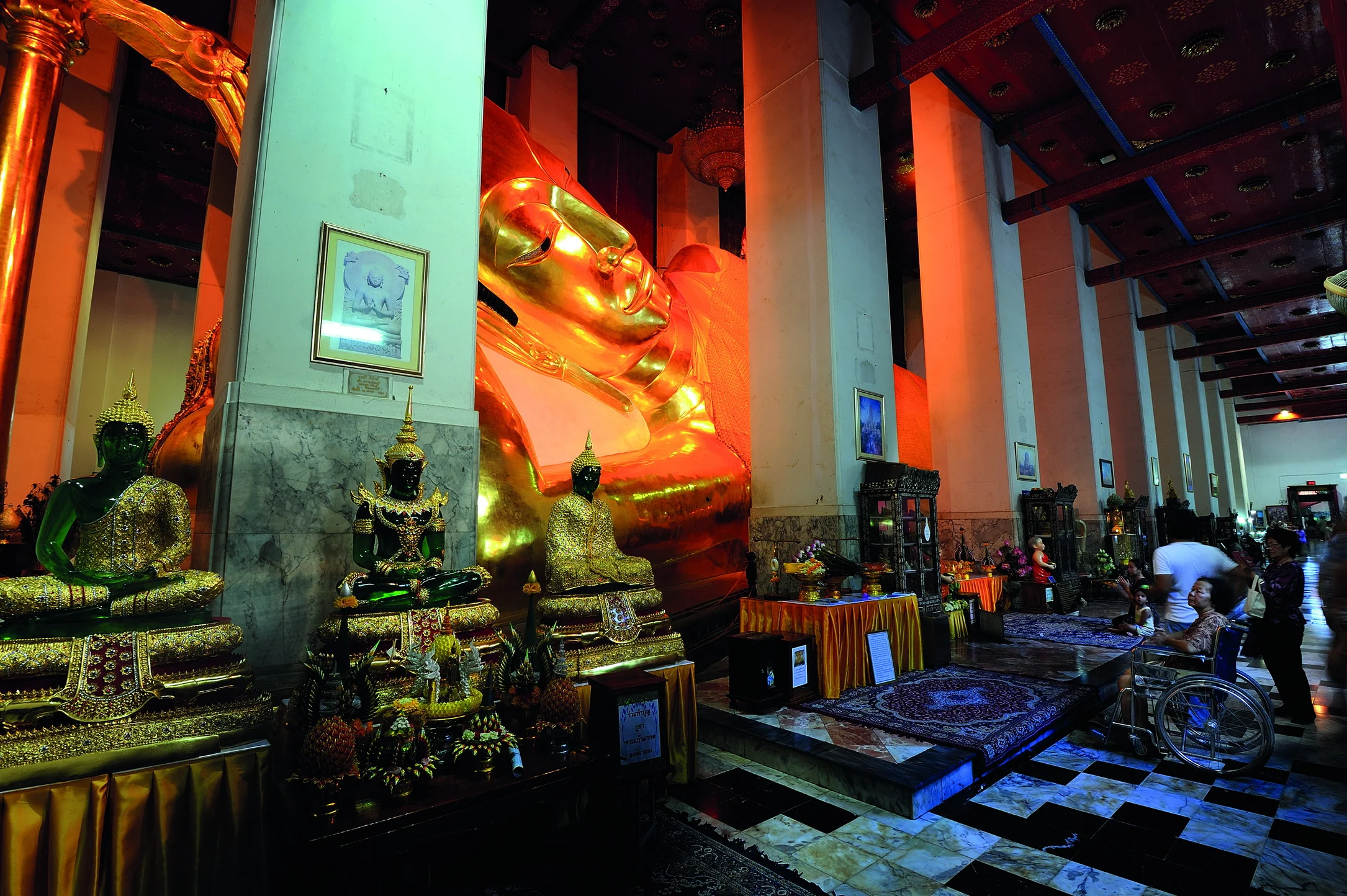 Inside the viharn of the 46-metre reclining Buddha at Wat Phra Non Chakkrasi, Sing Buri