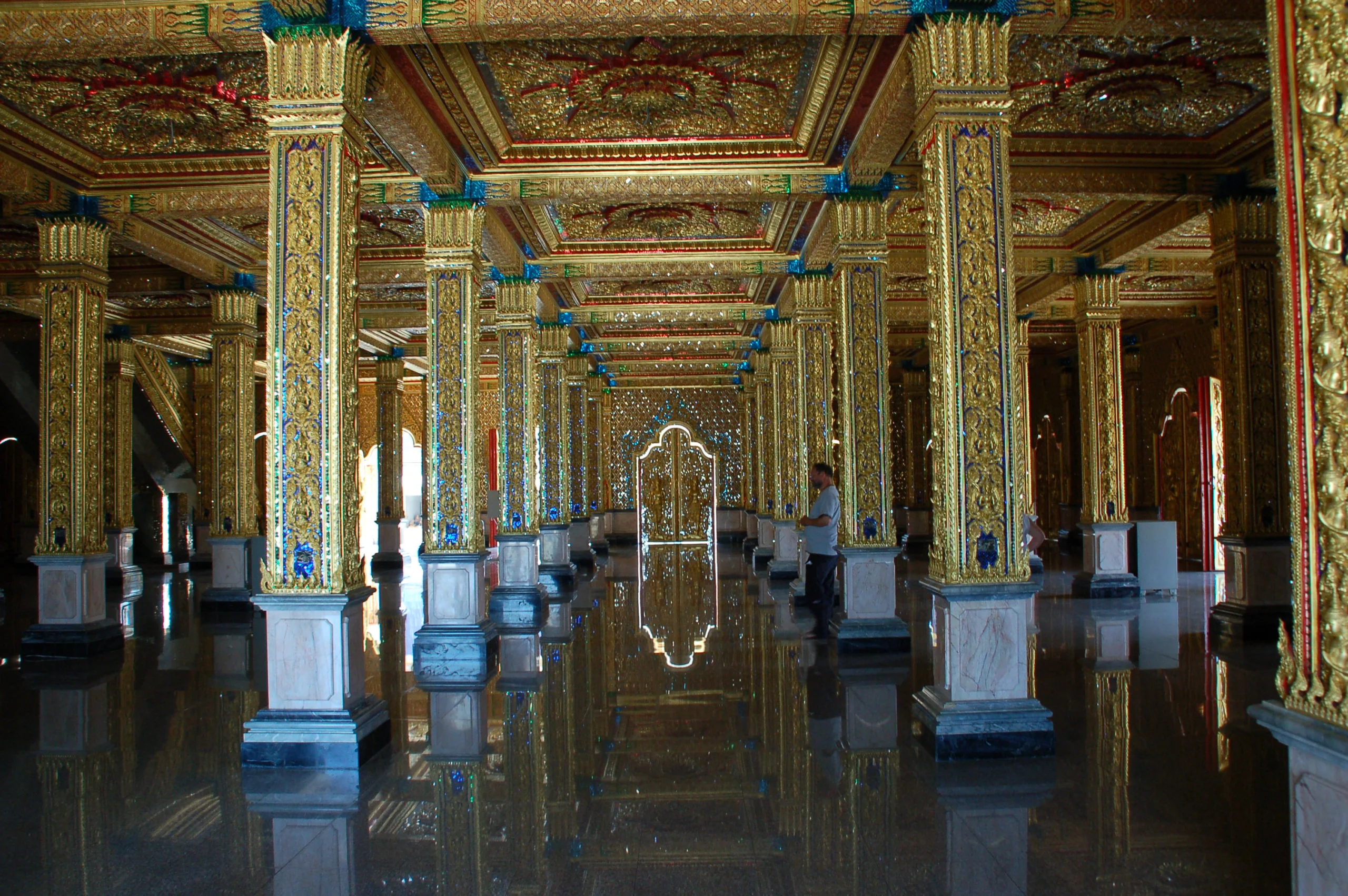 Mirrored pillars inside the crystal sanctuary of Wat Tha Sung, Uthai Thani