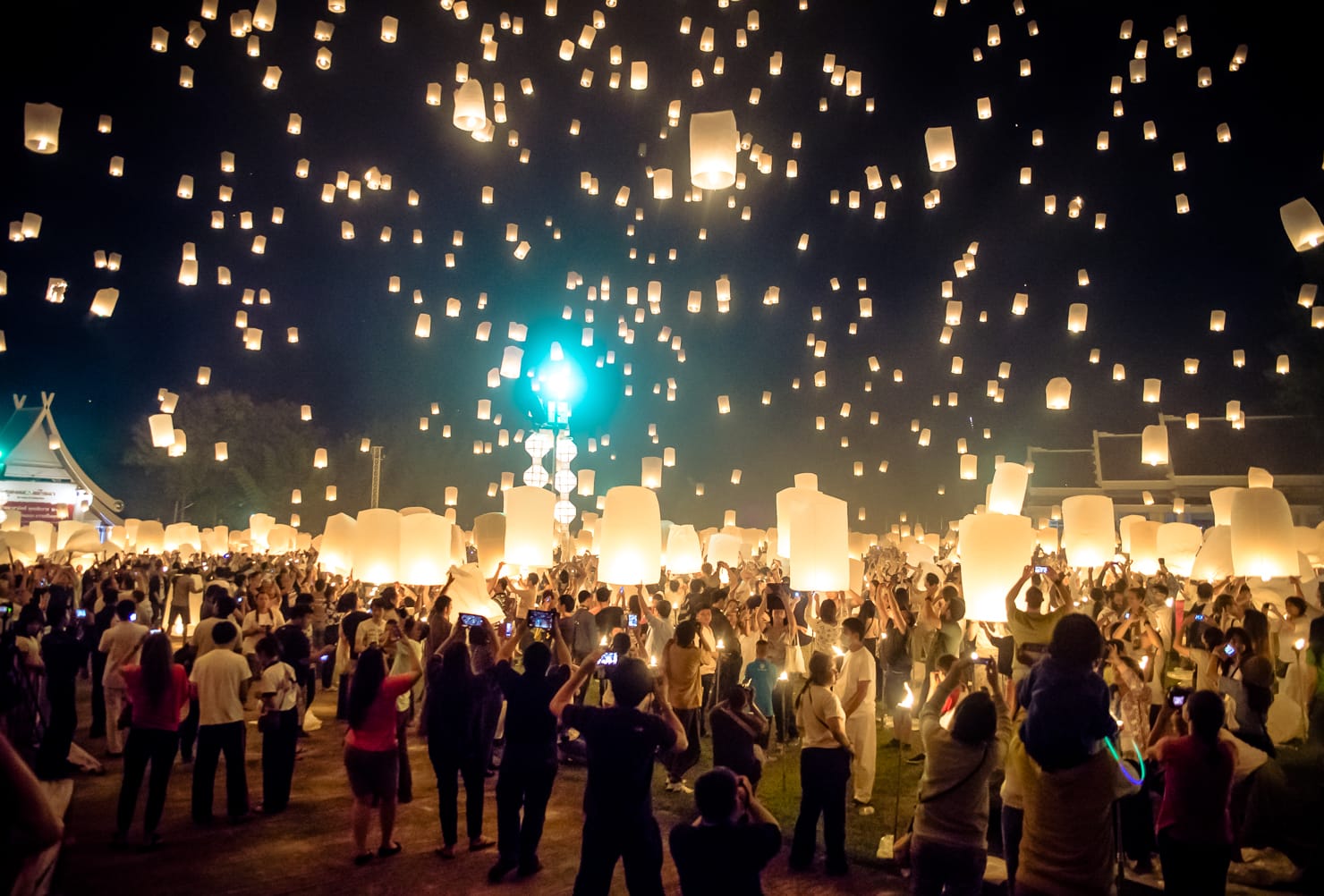 A khom loi lantern lit and held before release at Yi Peng, Chiang Mai