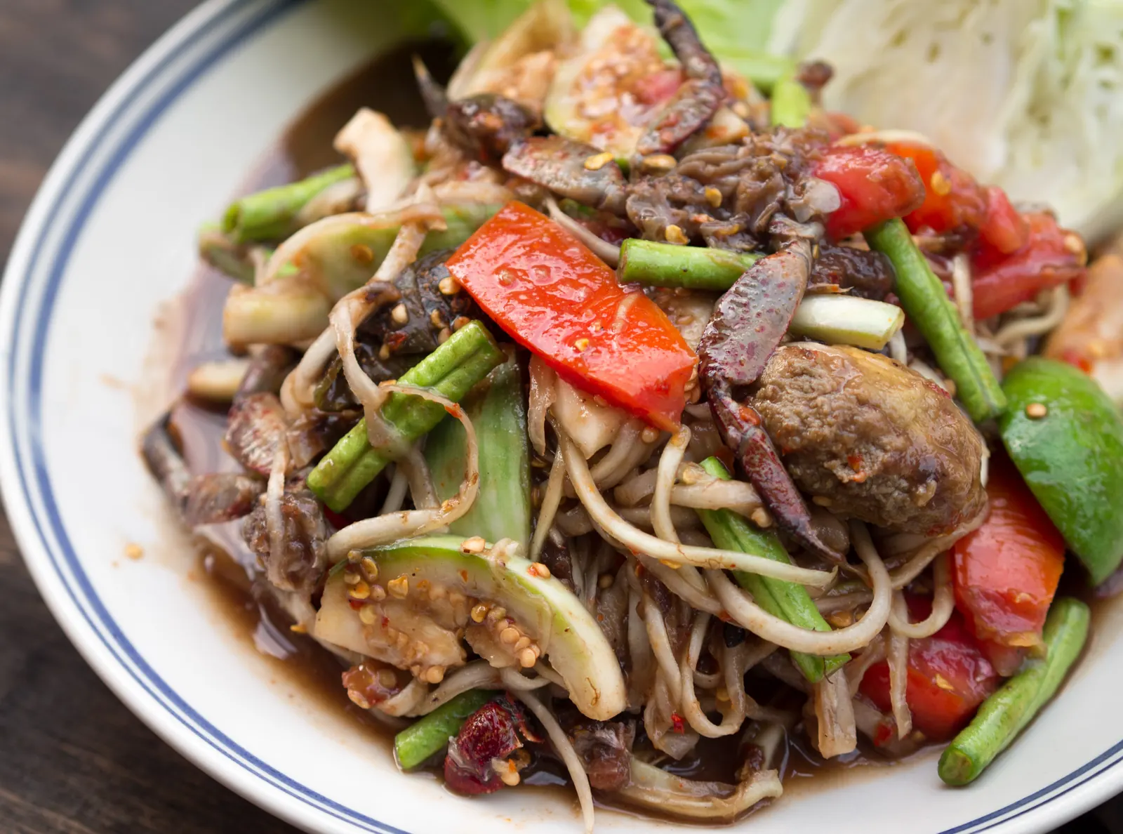 A plate of som tam Lao, the Isaan papaya salad with fermented fish sauce