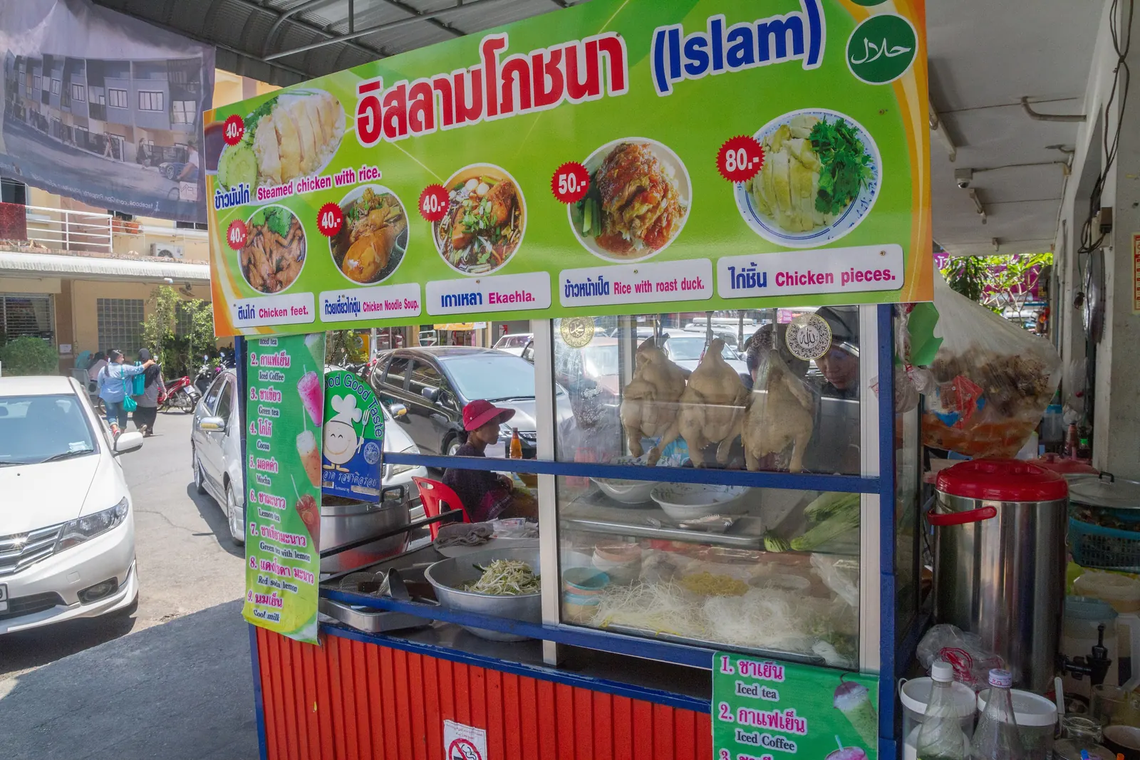 Street food vendors on a pavement in Krabi Town