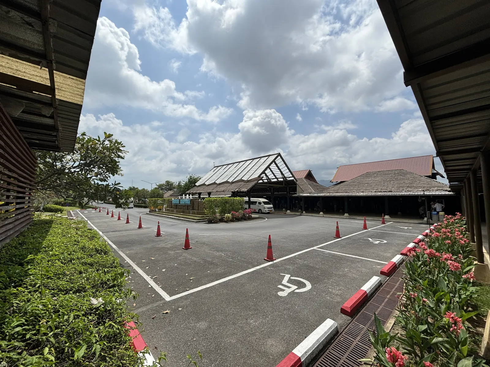 Open-air terminal pavilions at Samui airport Koh Samui with thatched roofs and no walls