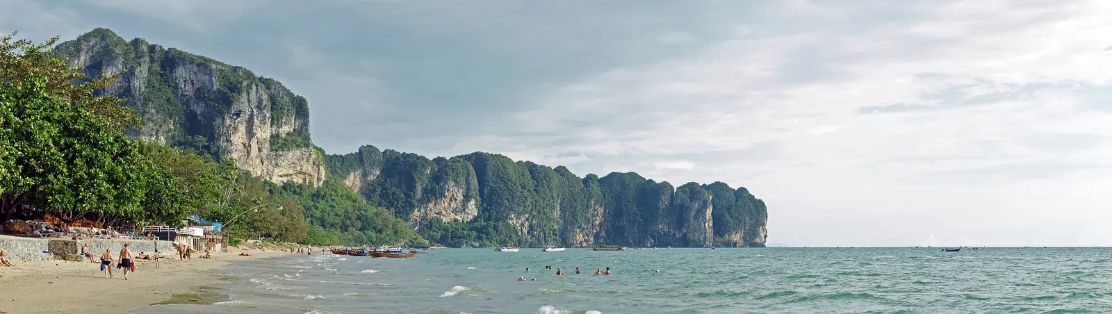 Panorama of Ao Nang beach and the limestone headland, Krabi