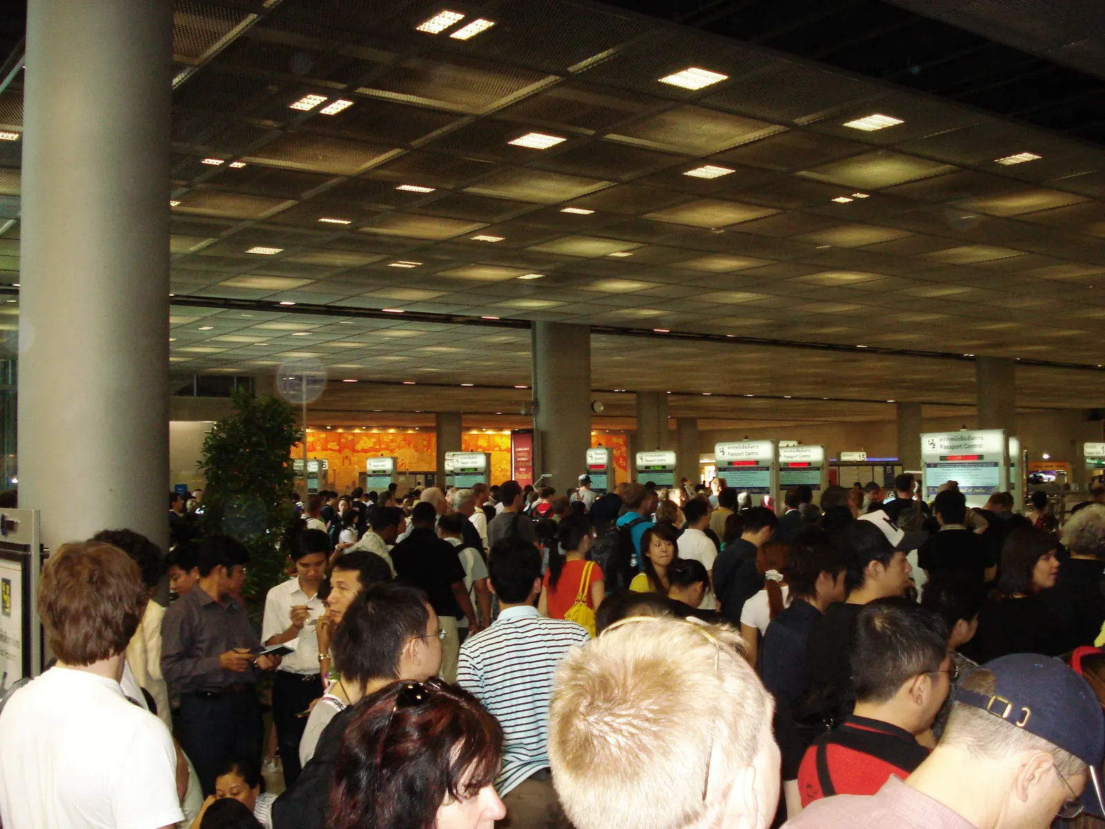 Crowded immigration queue at Suvarnabhumi Airport passport control