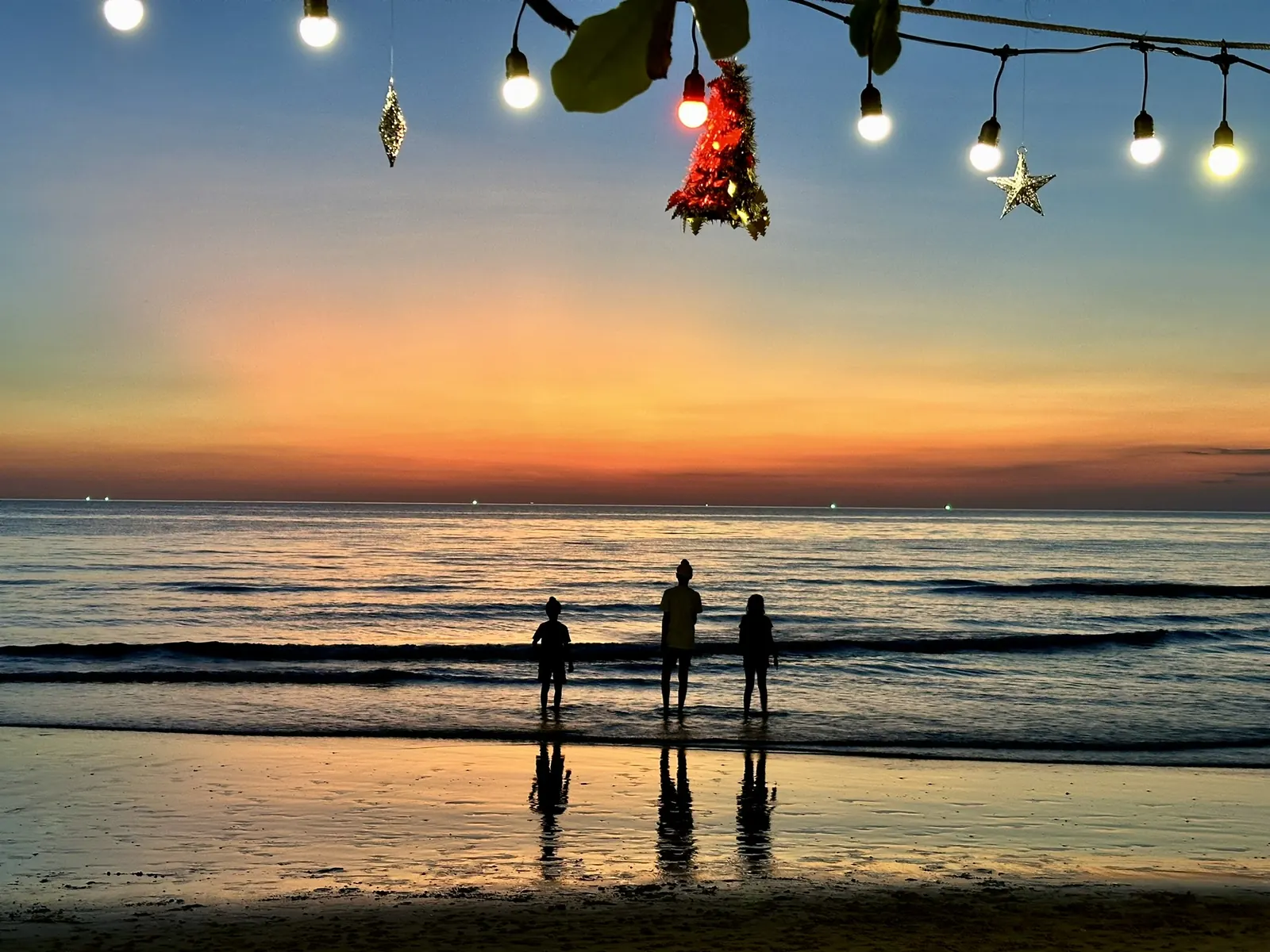 People on White Sand Beach, Koh Chang, in the early evening