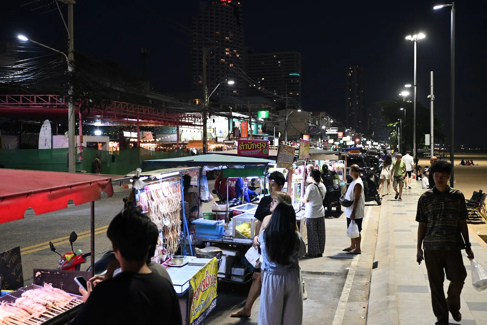 Night-market stalls along Pattaya's beach road under the lights