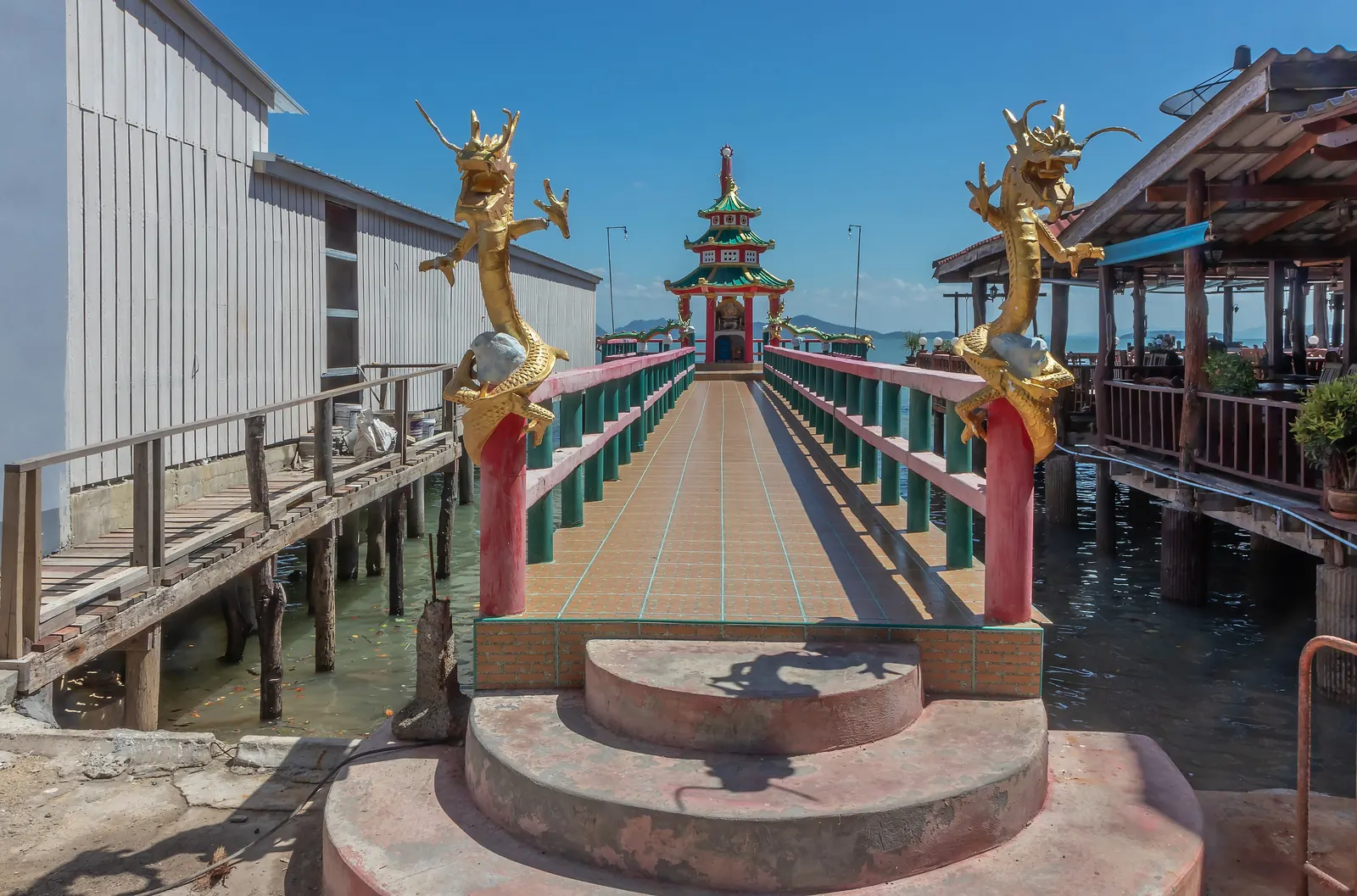 Chinese shrine at the northern end of Lanta Old Town, Koh Lanta, with red lanterns and incense