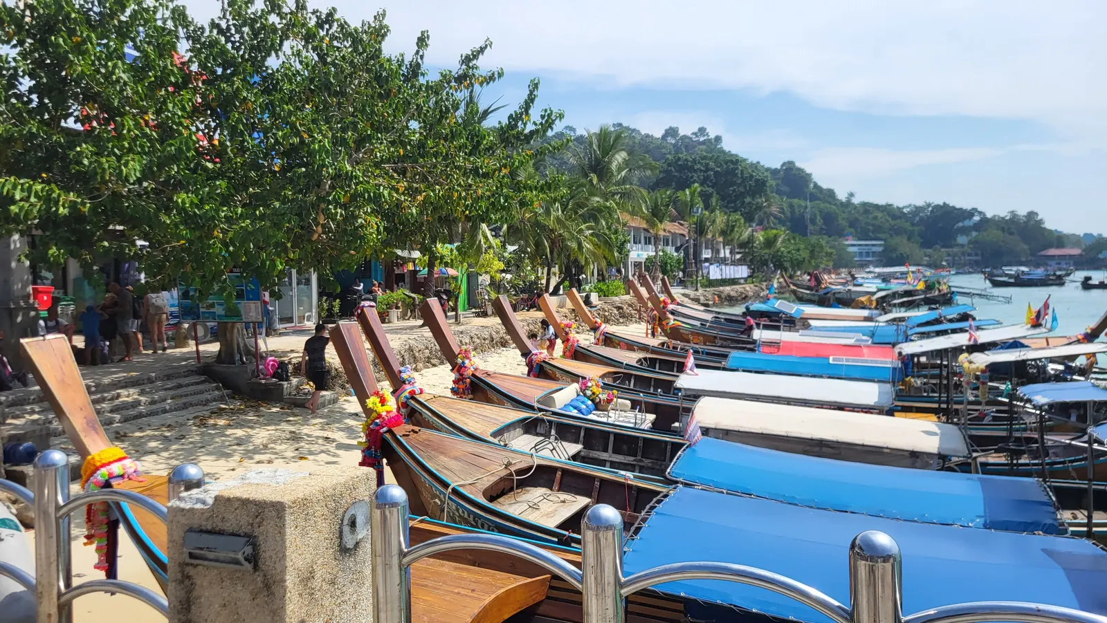 Ko Phi Phi Don in early 2025 with boats and limestone hills