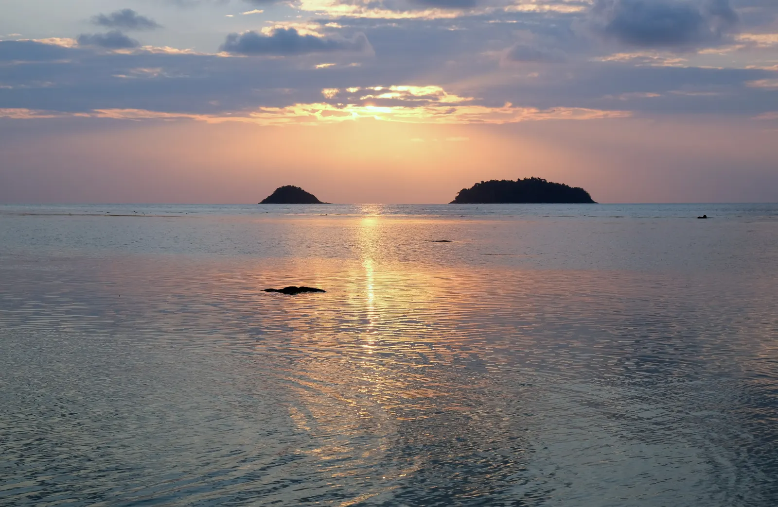Kai Bae beach on Koh Chang at sunset with the islets offshore, one of the best Koh Chang beaches to stay on