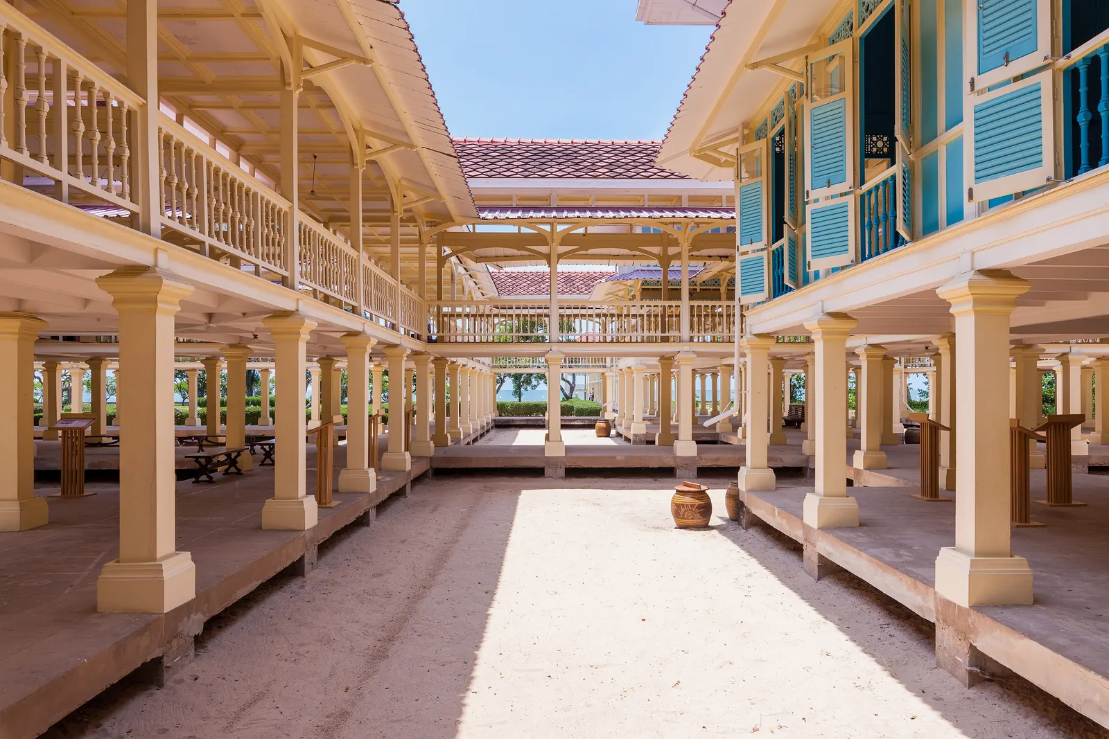The long teak walkways on columns at Maruekhathaiyawan Palace near Cha-am, north of Hua Hin