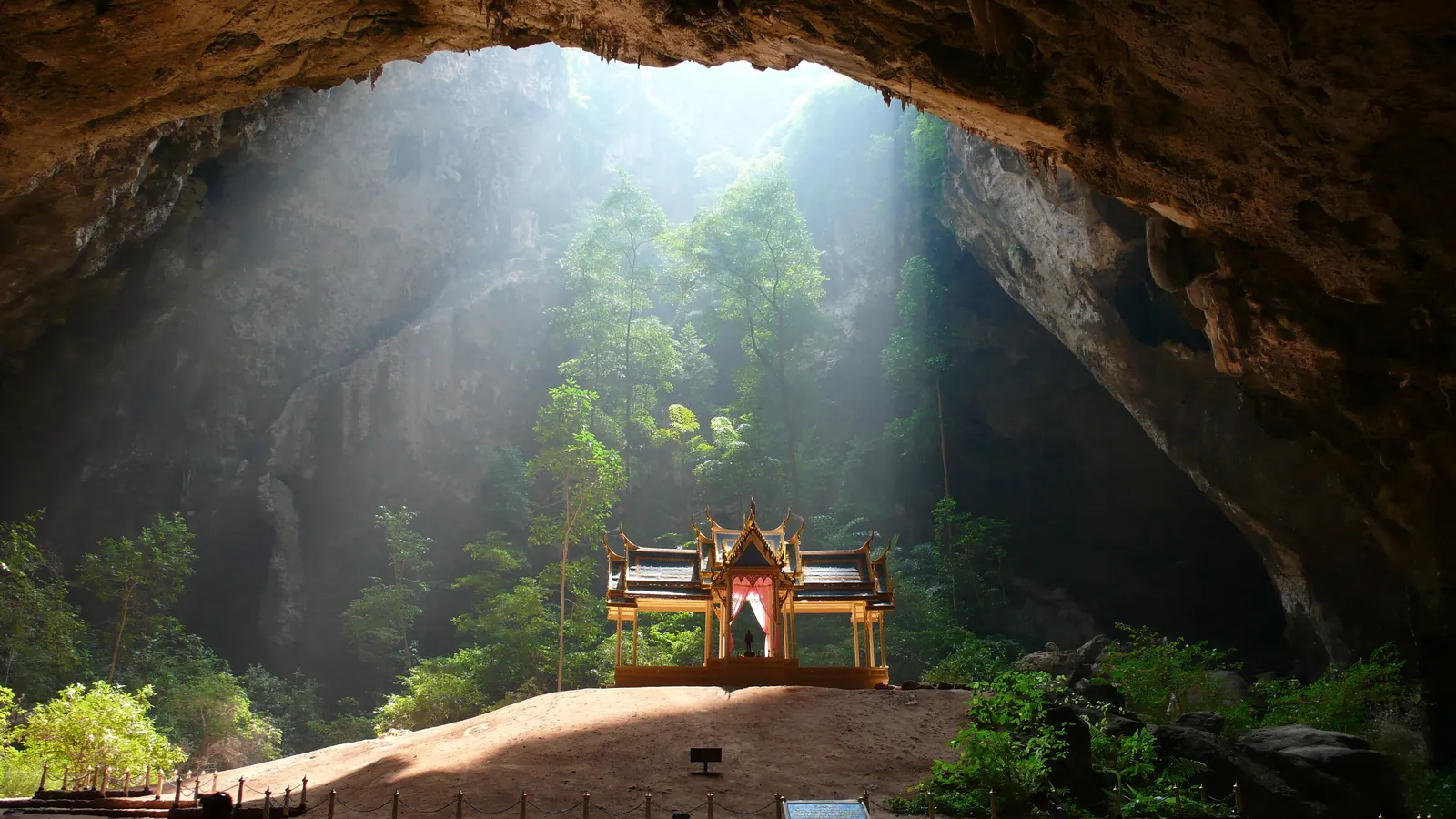The Kuha Karuhas pavilion lit by sunlight inside Phraya Nakhon Cave, Khao Sam Roi Yot National Park