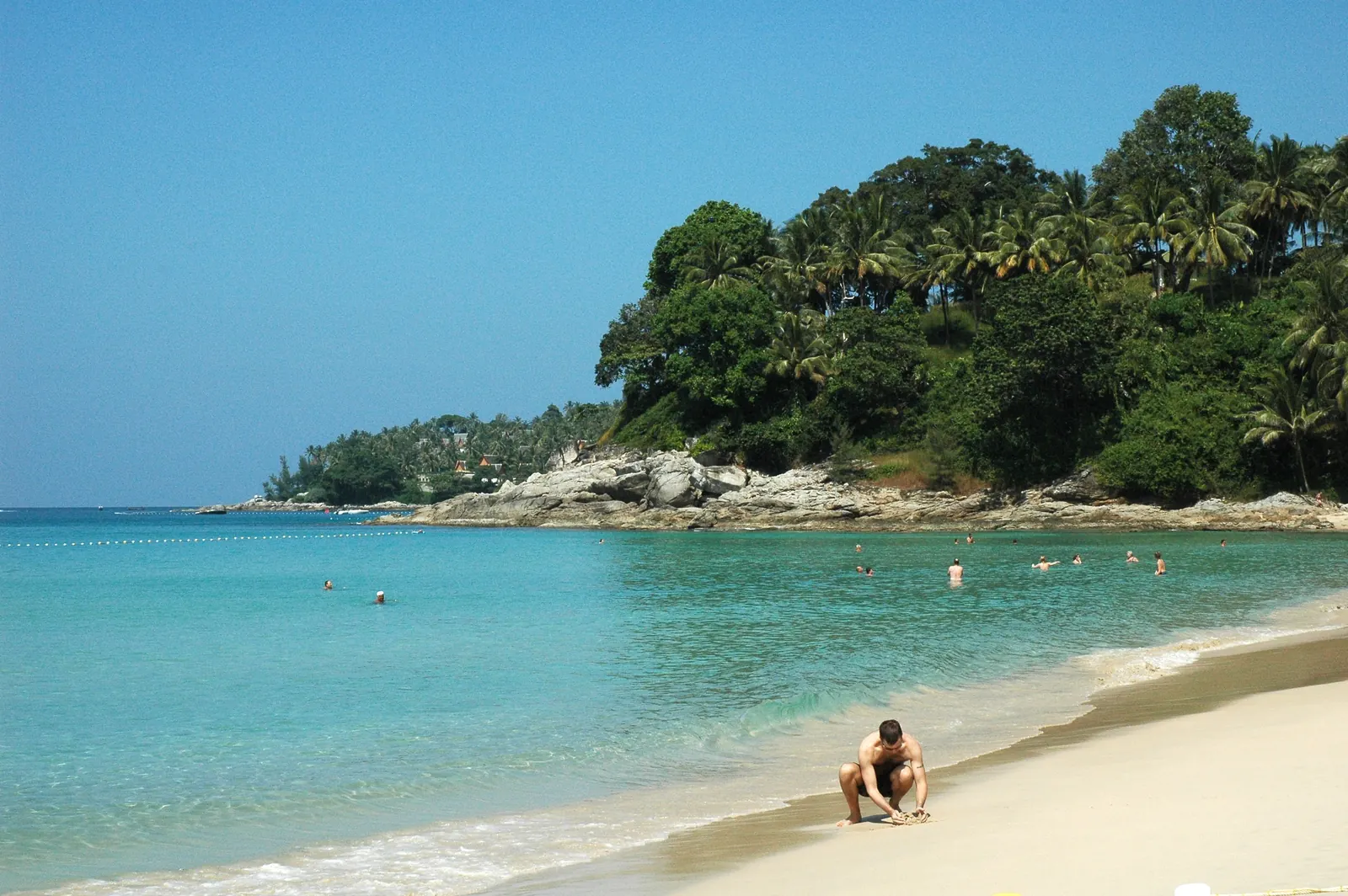 The north end of Surin Beach, Phuket, with pale sand and clear water