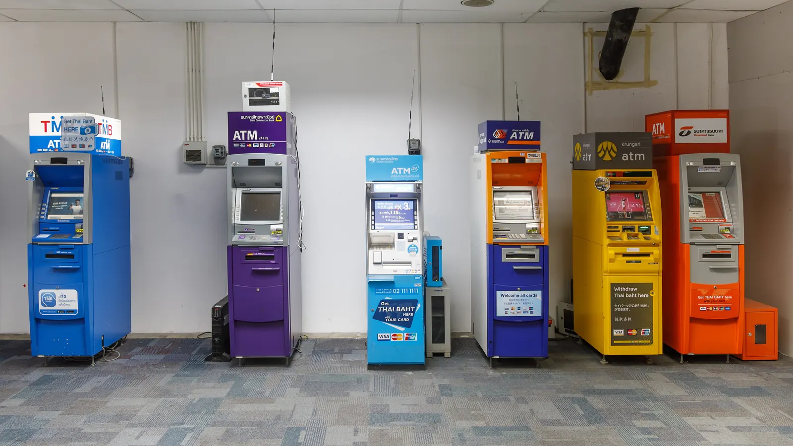 A row of Thai bank ATMs at Phuket International Airport