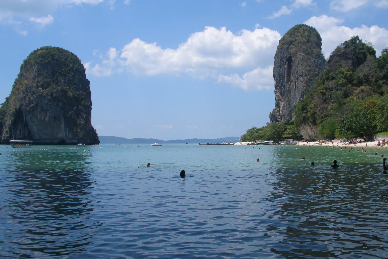 Railay Beach, Krabi: limestone cliffs and longtail boats on the west beach