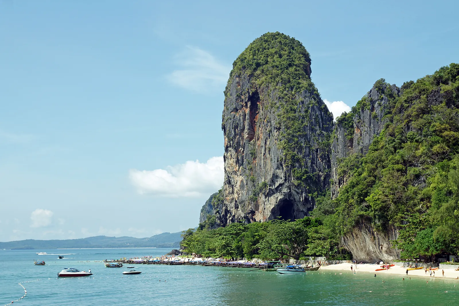 Phra Nang beach on the Railay peninsula, Krabi, with its limestone cliff and longtail boats