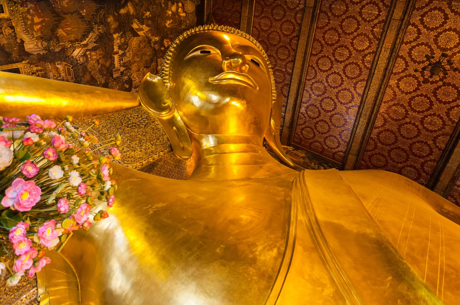 The Reclining Buddha's golden face at Wat Pho, Bangkok